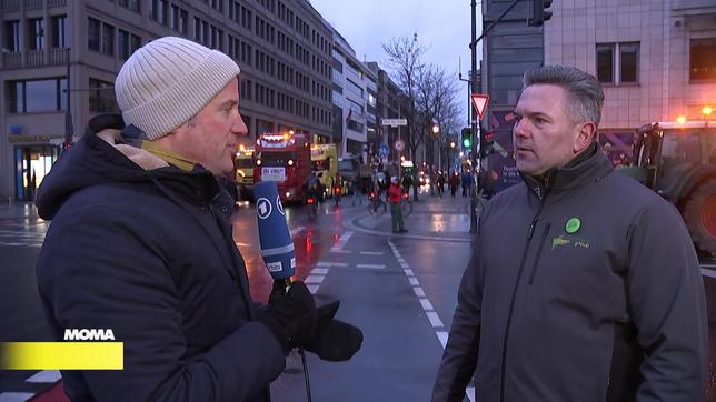 Reporter Markus Reher und Landwirt Martin Mandelkow