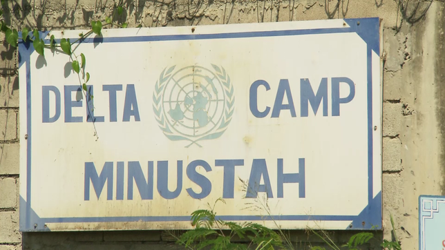 Schild Delta Camp Minustah