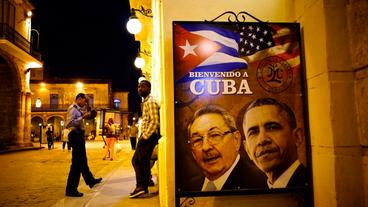 Barack Obama und Raul Castro auf einem Plakat