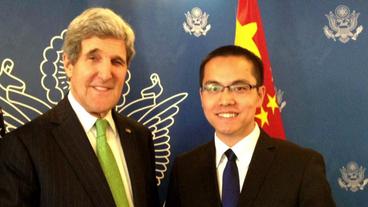 Zhang Jialong bei einem Treffen mit John Kerry.