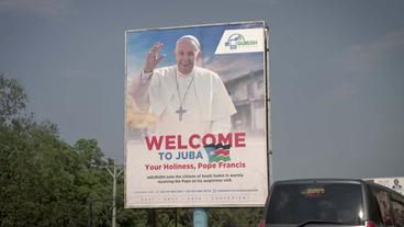 Plakat mit Abbildung von Papst Franziskus