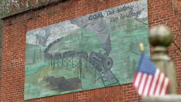 Gemälde an Mauer mit dem Schriftzug: "Coal: Our history ... our heritage"