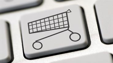 Icon Einkaufswagen auf Button einer Tastatur abgebildet