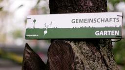Schild mit der Aufschrift Gemeinschaftsgarten
