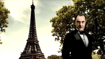 Bildquelle: NDR Victor Lustig neben dem Eiffelturm