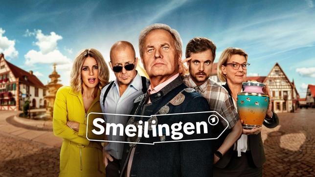 Bild: ARD/SWR/Constantin Entertainment/Alex J. Moll und Lennart Liemandt Sketch-Comedy im neuen Format: Smeilingen ist das garantiert komischste Dorf Deutschlands. Hier mimen 17 Top-Stars in sechs Folgen die eigenwillig-liebenswerten Bewohner, darunter Uwe Ochsenknecht (Mitte), Michelle Hunziker (li.), Heino Ferch (2.v.li.), Phil Laude (2.v.re.) und Mirja Boes (re.).