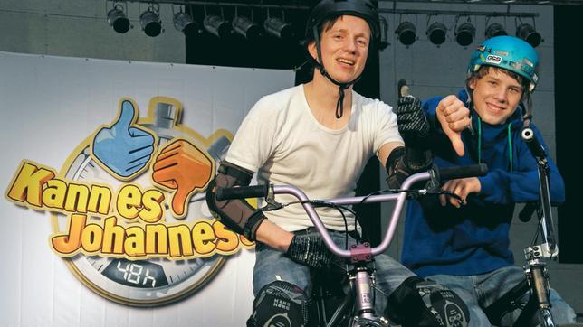 Moderator Johannes Büchs (l) mit Trainer Timo.