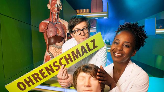 Bild: WDR/Thorsten Schneider Shary und Ralph beschäftigen sich heute mit dem Körper und untersuchen das, was er so hergibt. Dabei machen sie vor nichts halt: Sie pulen in Nasen, Augen und Ohren und klären, was Ohrenschmalz und Galle gemeinsam haben. Außerdem geben die beiden Körperforscher Antworten z.b. folgende Frage: Warum hat man fettige Haare?