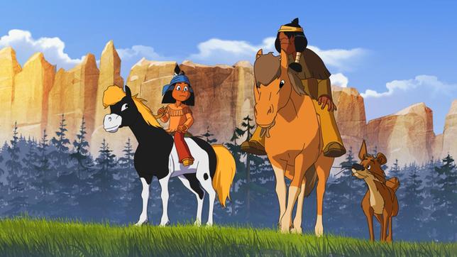 Bild: WDR/Ellipsanime Productions/Belvision Yakari mit Müder Krieger und Hund Knickohr auf dem Weg zum Bäumeschlagen für neue Tipis.
