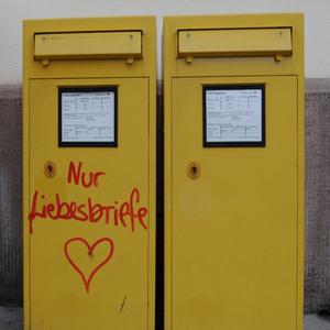 Emmendingen (Baden Wuerttemberg) - January 7, 2022 Graffiti on a postbox reading: LOVE LETTERS ONLY (nur liebesbriefe) 