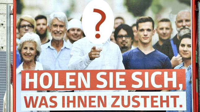 Bild: APA / dpa Wahlplakat mit Aufschrift "Holen Sie sich, was Ihnen zusteht"