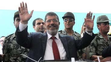 Bild: dpa Mohamed Mursi auf dem Weg zur Präsidentschaft