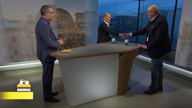 Bäckermeister Hermann Leimbgruber spricht mit Bundeskanzler Olaf Scholz, SPD