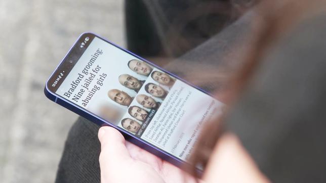 Schlagzeile auf einem Handy