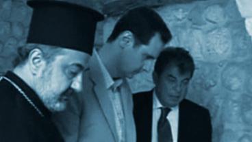 Präsident Assad mit einem Priester