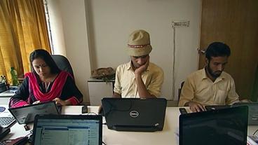 Mitarbeiter an ihren Computern