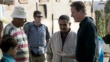Premier Cameron in einem Flüchtlingslager