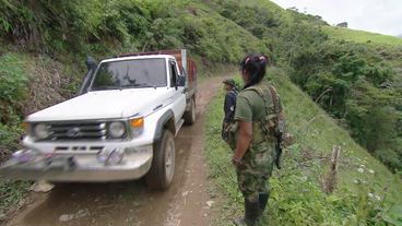 Farc-Kämpfer kontrollieren Auto