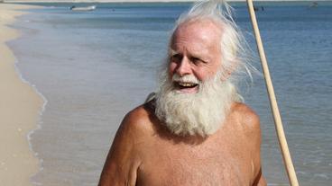 Ein Porträt von Dave Glasheen, aufgenommen am Strand der Insel Restauration Island in Australien.