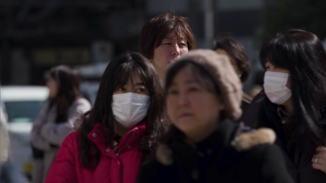 Japaner mit Masken