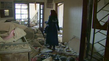 Syrien: Ein Rückkehrerin – freiwillig. Die Wohnung wurde durch Bombenangriffe total zerstört.