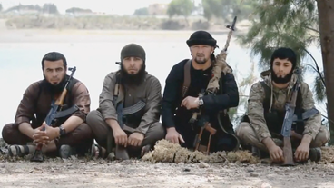 Propagandavideo des IS, vier Kämpfer mit Waffen