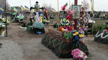 Grab von Oleksandr Mazijewskyj auf Friedhof 