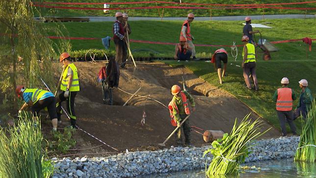 Arbeiter im Sarjadje-Park