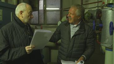 Wohnungseigentümer Reinhold Ruthner spricht mit Berater Wilhelm Madlener. Beide sind unzufrieden mit dem Ausgang ihrer Klage