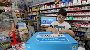 Bild: dpa/Oliver Berg Zusteller Hermes will Paketshops ausbauen