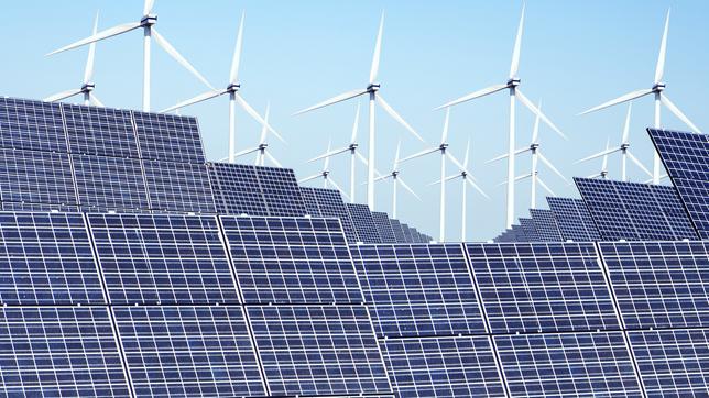 Bild: dpa / picture alliance / VisualEyze Solarzellen und Windräder