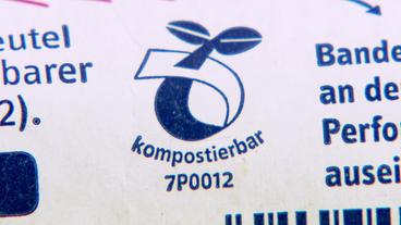 Logo mit der Aufschrift "Industriell kompostierbar".