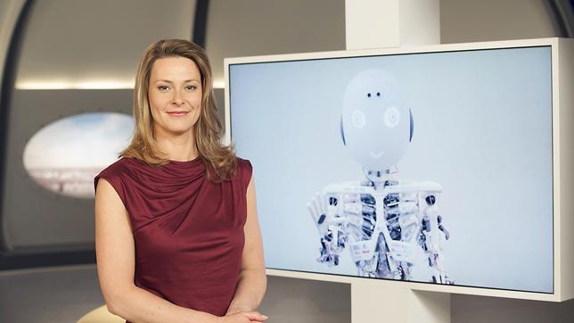Bild: ARD/Martin Rottenkolber Anja Reschke zeigt auf einem Bildschirm den Roboter