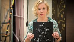 Stars der Lindenstraße mit Schild "Bring back Our Girls"