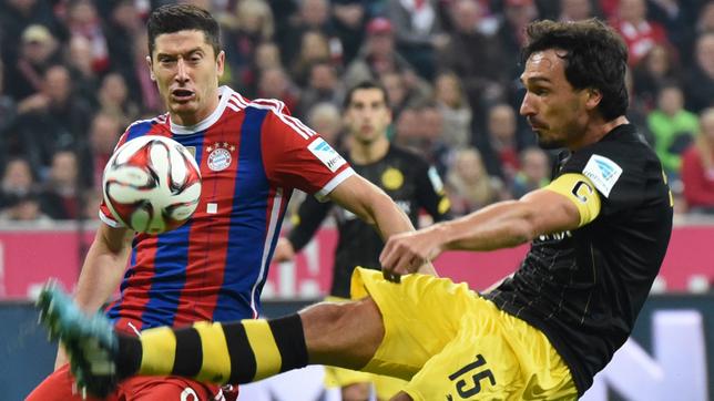 Bild: dpa Robert Lewandowski gegen Mats Hummels