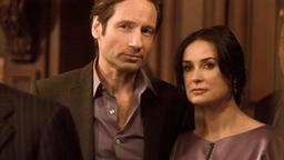 Auf einer Party nehmen Steve (David Duchovny) und Kate (Demi Moore) ihre neuen Nachbarn unter die Lupe.