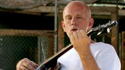 David Lurie (John Malkovich) findet beim Banjospielen seltene Momente der Ruhe.