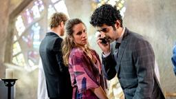 Faraz (Reza Brojerdi) und Viola (Amelie Kiefer) bekommen einen unerwarteten Anruf von Faraz' Eltern.