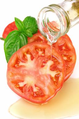 Bild: photos.com Tomaten mit Olivenöl