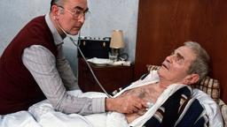 "Bargeld" am Sonntag, den 26.01.1986. Die Aufregung war zu viel für Joschi (Herbert Steinmetz, rechts). Dr. Dressler (Ludwig Haas) ermahnt ihn, sich zu schonen.