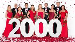 Am 20. Juli 2005 gab es 2000 Rosenblätter für 2000 Folgen "Rote Rosen" – die damaligen Darsteller beim großen Jubiläums-Shooting: (v.l.n.r.) Britta Berger (Jelena Mitschke), Thomas Jansen (Gerry Hungbauer), Johanna Jansen (Brigitte Antonius), Ben Berger (Hakim-Michael Meziani), Jana Greve (Jenny Jürgens), Nora Franke (Anne Moll), Gunter Flickenschild (Hermann Toelcke), Merle Vanlohen (Anja Franke), Torben Lichtenhagen (Joachim Kretzer), Carla Saravakos (Maria Fuchs).