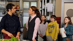 Nils, Carla und Schulkinder